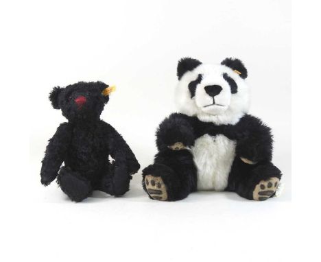 A black Steiff teddy bear, 30cm high, together with a Steiff panda bear