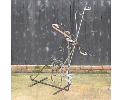 A black painted wrought iron weather vane, 120cm wide