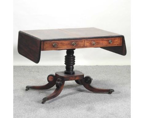 A Regency rosewood and strung sofa table, on a ring turned column and quadruped base, 150cm150w x 66d x 70h cm