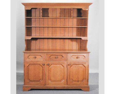 A modern light oak dresser158w x 52d x 197h cm