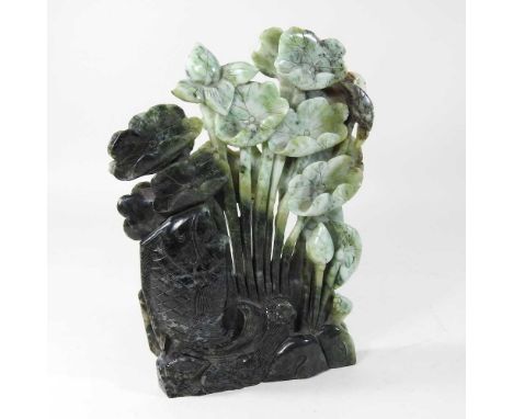 A large Chinese carved jade coloured stone model of fish,