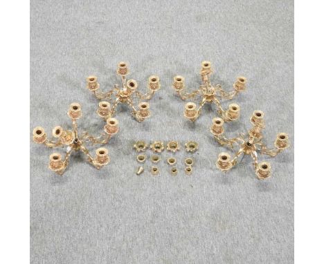 A set of four modern ormolu five branch candelabra sconces,, each 35cm diameter