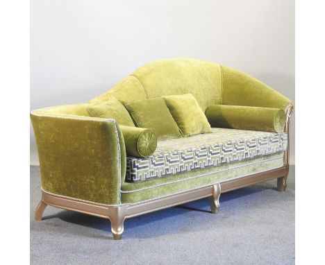 A gilt framed and green upholstered sofa, with geometric design cushion and shaped back214w x 82d x 104h cm