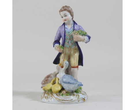 A Naples porcelain figure, of a boy with geese, 13cm high