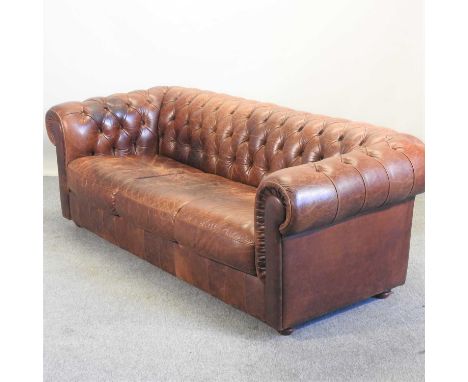 A brown leather upholstered button back chesterfield sofa206w x 87d x 73h cm