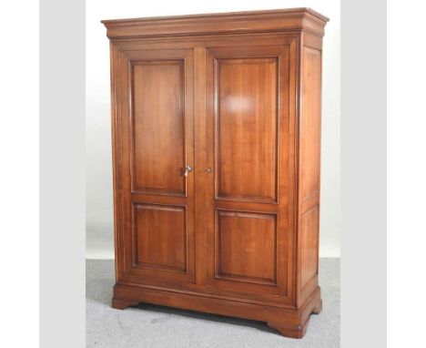 A modern cherrywood double wardrobe, enclosed by a pair of panelled doors147w x 65d x 210h cmCondition report: Overall is sol