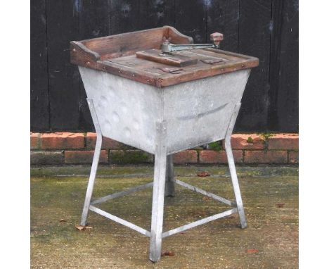 A vintage laundry, on a galvanised stand, 53cm