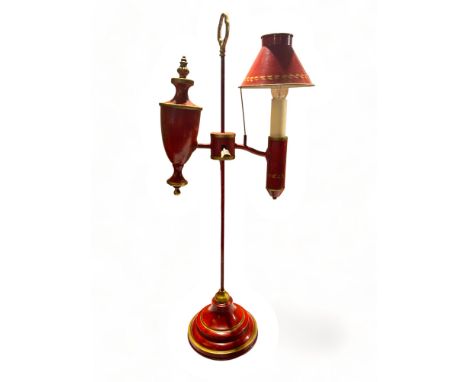 A Regency style red tole student's lamp and another in green and gilt&nbsp;
Both adjustable light,&nbsp;fitted for electricit
