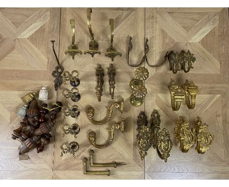 A group of 19th century and vintage curtain tie-backs and a curtain pole
Including seven pairs of 19th century gilt bronze ti