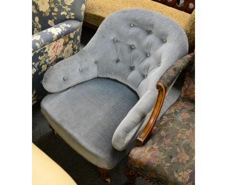 A 19th century button back armchair 