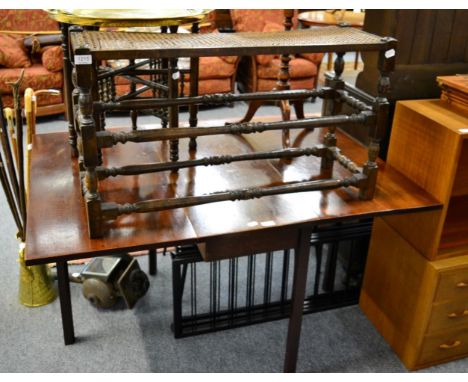 A mahogany drop leaf table, tripod table and a cane work stool