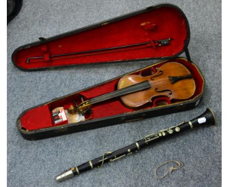 Three quarter size German violin with bow, in case, and a clarinet 