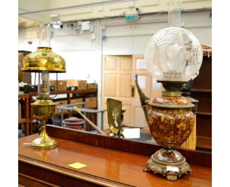 A 19th century metal mounted ceramic oil lamp with etched glass shade and a brass oil lamp (converted)