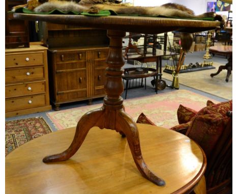 A George III oak tilt top tripod table 