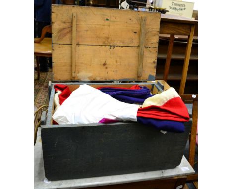 A painted wooden trunk containing two Union Jacks, etc