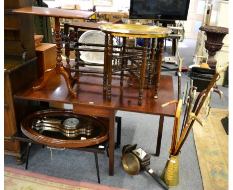 A 1950's coffee table, a middle eastern brass topped folding table, a mahogany framed mirror, an oak barometer, a carriage la