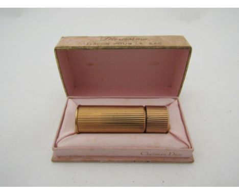 CHRISTIAN DIOR: Vintage yellow metal perfume bottle, Diorissimo, original box a/f 