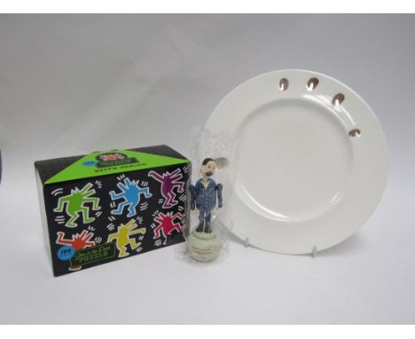 A Richard Wentworth "Three hundred and sixty degrees" art designed pottery plate, printed marks to base, an Ai Weiwei wooden 
