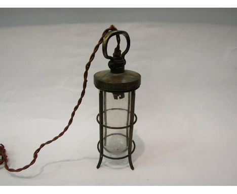 An Arts and Crafts brass lantern with glass domed shade. Collectors electrical item. 31cm high 