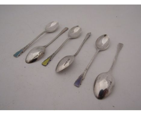 Six silver teaspoons with enamel terminals 