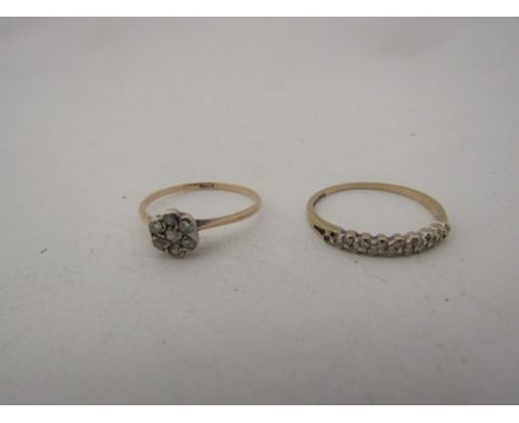 A 9ct gold half hoop diamond ring, some stones missing, size N/O 1g and diamond daisy ring size M, 1.1g both worn 