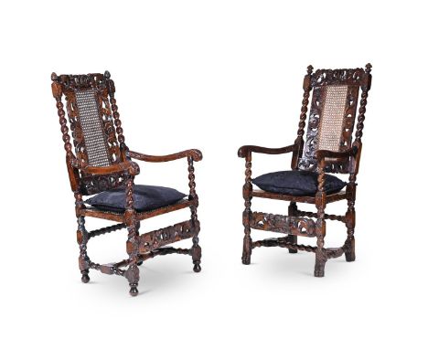 A HARLEQUIN SET OF TEN WALNUT DINING CHAIRS IN CAROLEAN STYLE 19TH CENTURY To include two armchairs, each chair with a carved