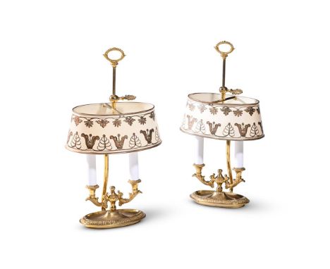 A PAIR OF GILT METAL TWIN LIGHT TABLE LIGHTS IN THE FRENCH EARLY 19TH CENTURY MANNER  OF RECENT MANUFACTURE  Each with a boui