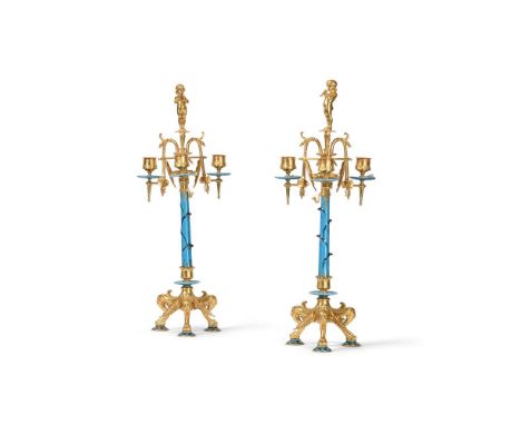 A PAIR OF ORMOLU AND PORCELAIN THREE LIGHT CANDELABRA  ATTRIBUTED TO LOUIS CONSTANT SEVRIN, FRENCH, LATE 19TH CENTURY  With b