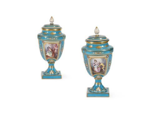 A PAIR OF SEVRES-STYLE TURQUOISE-GROUND, 'JEWELLED' AND GILT PORCELAIN URNS AND COVERS LATE 19TH CENTURY Decorated with fete 