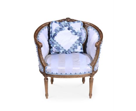 A GILTWOOD AND UPHOLSTERED TUB ARMCHAIR IN LOUIS XVI STYLE  EARLY 20TH CENTURY 81cm high, 76cm wide, 61cm deep overall   Cond