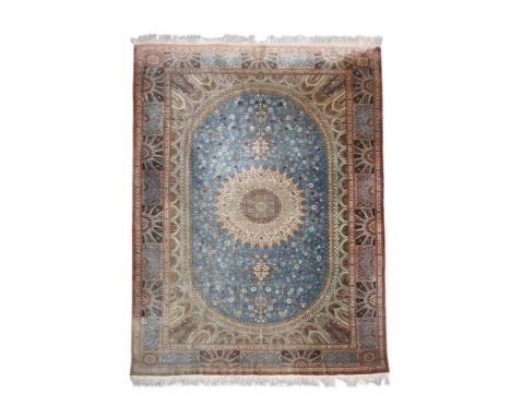 A QUM SILK RUG approximately 295cm x 197cm  Condition Report:  Some colour variation from UV exposure, pile uniform overallFr