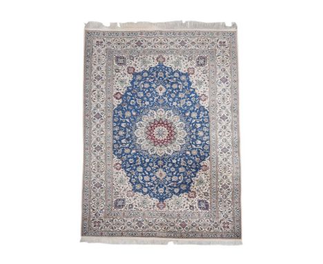 A TABRIZ PART SILK RUGapproximately 259cm x 161cm  Condition Report:  Overall presentable order, the rug does not appear to p