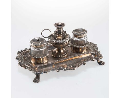 A GEORGE III SILVER INKSTAND by John Roberts &amp; Co, Sheffield 1814, with a gadrooned border, two pen trays, a central cham