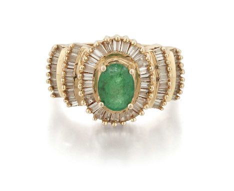 AN EMERALD AND DIAMOND CLUSTER RING an oval-cut emerald within a border of tapering baguette-cut diamonds. Estimated total di