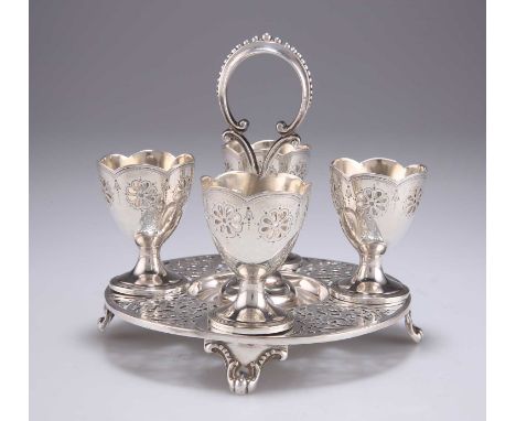 A VICTORIAN SILVER EGG CRUET by Henry Wilkinson &amp; Co, Sheffield 1872, the pierced circular stand with beaded handle and s