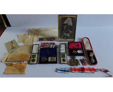 An extensive collection of Empire medals awarded to Major General Sir Pomeroy Holland Pryor, also clippings and cards and an 