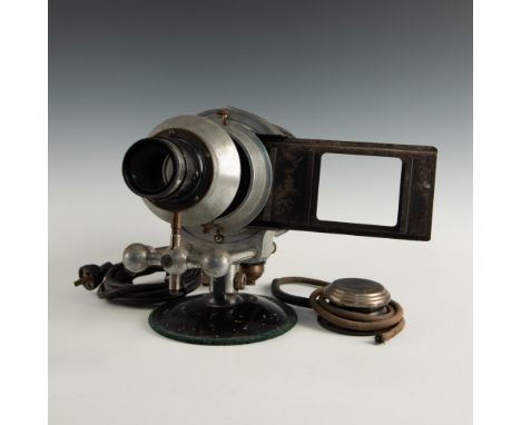 Early Victor Animatograph Stereopticon projector and slides.Designed to project images from glass plate slides, with differen