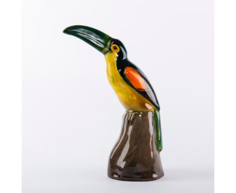 Majestic bird with green beak. Rare colorway.Doulton backstamp.  Issued: C. 1918 Dimensions: 7.5"H Manufacturer: Royal Doulto