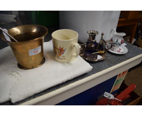 BRASS MORTAR AND PLATED SPOON AND PLATED CANDLESTICK