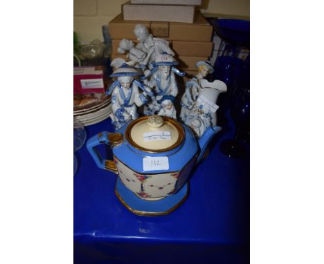 TEA POT AND STAND AND GROUP OF CERAMIC BLUE AND WHITE FIGURINES