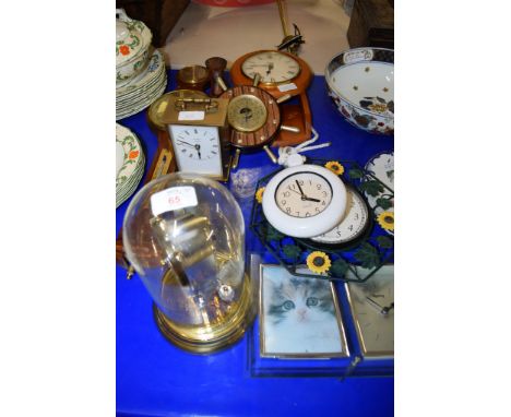 MODERN CLOCK IN GLASS DOME AND OTHER CLOCKS AND A BAROMETER