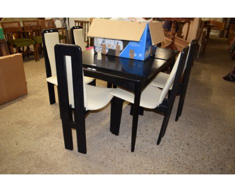 BLACK LACQUERED DINING SUITE OF TABLE AND SIX CHAIRS