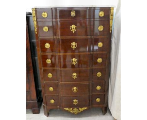 A modern Louis XVI design mahogany commode with a marble top, over seven long drawers with ormolu mounts, raised on bracket f