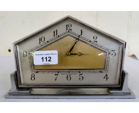 An Art Deco chromium plated timepiece, faced by an Arabic dial&nbsp; 5.5"h&nbsp; 8"w 
