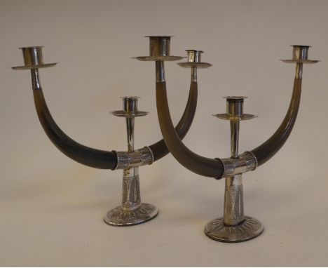 A pair of Malaysian white metal mounted and horn, twin branch pedestal candelabra&nbsp; bears impressed marks&nbsp; 10.5"h&nb