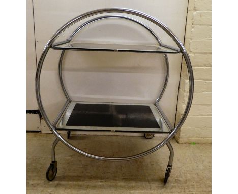 A reproduction of an Art Deco inspired, chromium plated, framed and glazed, two tier hostess trolley, on casters&nbsp; 31"h&n
