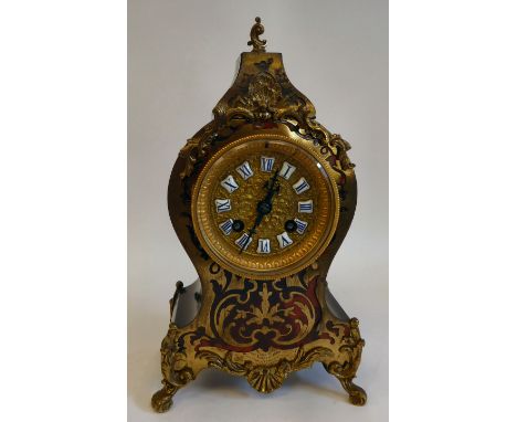 A late 19thC French black lacquered and boulleworked cased mantel clock of waisted, balloon form; the gong strike movement fa