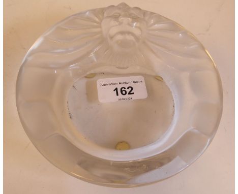 A Lalique part-frosted crystal ashtray 'Tete de Lion'&nbsp; bears an etched Lalique, France signature&nbsp; 5.75"dia 