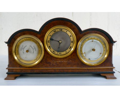 A 20thC walnut cased desktop clock, incorporating a barometer, timepiece and thermometer&nbsp; 7.5"h&nbsp; 13"w 