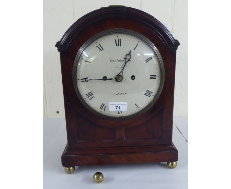A circa George III mahogany cased mantel clock; the chain driven bell strike movement faced by a Roman dial, inscribed George